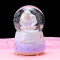 Purple mermaid snow globe music box with shell figurines and a glittery starry background - Shell Mermaid Purple