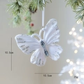 White flocked butterfly Christmas ornament with silver glitter and rhinestones on pine branch - Butterfly