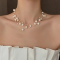 Elegant floating irregular pearl choker necklace with invisible thread on model neck - White Silver Star Hidden Pearl Necklace