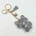 Creative cartoon cat keychain with grey rhinestones, gold tassel, and bell accessory - Grey and Gunmetal Black