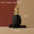 Large decorative pineapple ornament in matte black and gold finish, 23cm height - Large / Black