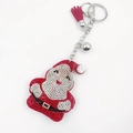 Close-up of Santa Claus keychain with colorful rhinestones and pink tassel charm - Classic Santa Claus Face
