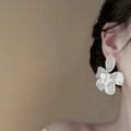 Elegant white resin flower earrings with marble texture on a female model side profile - Marbled Flower Resin Drop Earrings - White (39#)