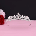 Detailed view of luxury baroque silver crown featuring sparkling teardrop crystals - No.12 Silver (White Stone)