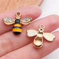 DIY bee pendant with black and yellow enamel, rhinestones and golden metal finish - Rhinestone Bee