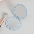 Light blue foldable double-sided round pocket makeup mirror with small cosmetics brush - Light Blue