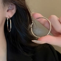 Macro detail of geometric silver hoop earrings with a sleek metallic finish - 40mm Silver Classic Hoop Style (36#)