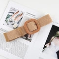 Detail of bohemian straw woven belt featuring a square buckle on a fashion magazine - Square Buckle Light Camel