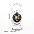 Detail shot of golden letter Y butterfly bottle opener keychain with size specifications - Letter Y