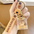 Cute Capybara liquid oil keychain with silicone strap and gold metal clasp - Square Capybara - Lying