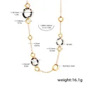 Detail showing stainless steel sweater necklace specs with leopard print acrylic ring - Gold Double Circles Leopard