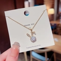 Elegant 18K gold-plated titanium steel necklace featuring a crystal bunny head pendant - X168 Gold Rabbit Zirconia