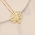 Golden bull head necklace with micro-pave zircons on a soft gradient background - Carved Bull Style with Transparent Gemstones (6#)