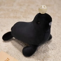 Soft black seal plush toy with a white circus ball detail on a cozy rug - Black Seal Lion / 25cm