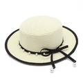 Classic white flat top straw hat with elegant pearl decorations and black ribbon bow tie - Creamy White