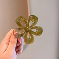 Translucent dark green camellia flower hair claw clip with glossy finish and metal spring - 10# Jelly Olive Green