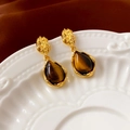 Detail of vintage tiger eye teardrop earrings with gold plating on a white ceramic plate - Silver Pin-Coffee (Real Gold Plating)