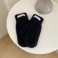 Winter black faux mink fur mittens with Hand Made label on a minimalist white table - Black