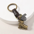 Vintage bronze roller skate keychain with brown leather handle and engraved metal tags - Ice Skate