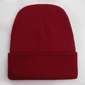 Close-up of wine red knitted beanie showing fine textured stitching and warm yarn material - One Size / Burgundy