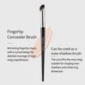 Angled nose shadow and concealer brush with synthetic bristles and matte black handle - G1036 Finger-tip Concealer Brush