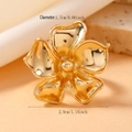 Macro shot showing dimensions of gold flower ring with 1.7cm inner diameter and 2.9cm width - Five-Petal Flower Ring / KC Gold