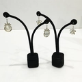 Bowknot earrings with opal and pearl accents on black velvet jewelry display stands - Velvet Sprout Pendant Stand
