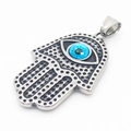 Macro detail of Hamsa Hand pendant with blue evil eye inlay and textured steel finish - Hamsa Hand Evil Eye Style (Style 17)