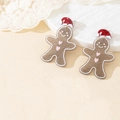 Orecchini a forma di omino di pan di zenzero glitterati con cappello di Babbo Natale - Omino di pan di zenzero