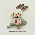 Detail view of rabbit fabric brooch with carrot bib and embroidery, size 9cm x 7cm - No Pin Style / Green Bunny