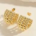 Close-up of golden CCB cluster bead earrings with polished spherical surface detail - CCB Beads-Gold