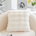 White faux fur fluffy square throw pillow on a modern armchair for home decor - Bubble Plush-Beige-With Insert