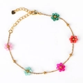 Golden woven bracelet featuring colorful floral beads and a heart charm pendant - Bracelet / Multicolor Flower