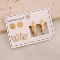 Macro detail of three-pair stainless steel earring set with floral and butterfly designs - Daisy Butterfly Style (E601) / 3 Pairs Set