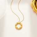 Macro shot of gold circular pendant with six small diamonds and screw motifs on chain - Round Screw Pattern Style (523) / Gold