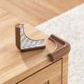Set di due paraspigoli in silicone marrone con adesivo 3M per la sicurezza bambini - Forma L-Caffè