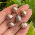 Baroque natural pearls pendants in iridescent purple and champagne with gold plated loops - No.38 Single Loop Width 8-10mm