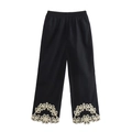 Schwarze Damen-Weitbeinhose mit Blumenstickerei und eleganten Lochmuster-Details am Saum - S / Schwarze bedruckte Hose
