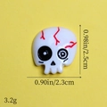 White resin skull bead with red cracks and dimensions for Halloween DIY accessories - Bright Pink
