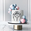 Detail of baby shower cake topper showing a 9.5cm minimalist line art of parent hands - Hands Holding Feet Style 1 / Black