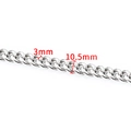 Macro detail of 10.5mm silver stainless steel Cuban chain with 3mm link thickness - Round Grind Chain 10.5mm