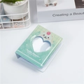 Detailed view of light green 3-inch photo album with cute bear and heart cutout cover - Green Heart Bear