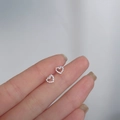 Elegant 925 sterling silver heart stud earrings with detailed beaded edge texture - Hollow Heart IV / Silver