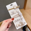 Detail of five-piece hair clip set featuring pearls, rhinestones and marble resin - New Camellia 5-piece Set