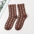 Brown cotton crew socks with orange floral patterns and scalloped edge detail - One Size / Dark Coffee