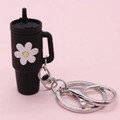 Black mini cup keychain with white daisy floral design and silver metal clasp link - Black Flower Cup Keychain