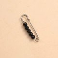 Silver waist cincher pin with five round black pearls on a textured background - 5cm 5 Black Beads Silver