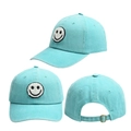Detail of mint green cotton baseball cap showing smile embroidery and metal buckle - Lake Blue
