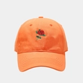 Detailed close-up of orange cotton baseball cap featuring delicate rose flower embroidery - Adjustable / Orange
