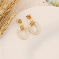 Detail shot of gold geometric earrings with white oval inlays and dried wheat background - 6# Oval White